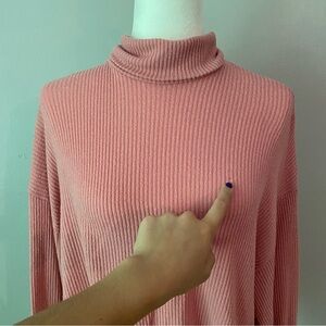 Pink turtleneck sweater